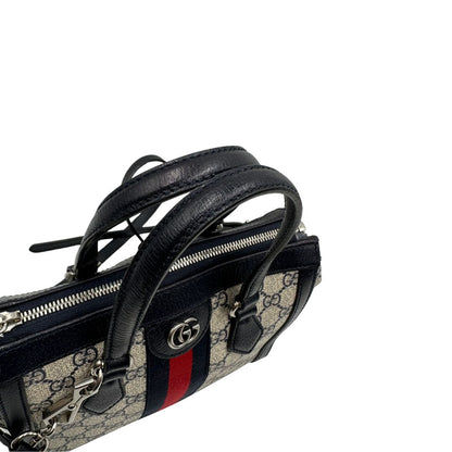 manici Borsa Gucci in canvas GG, finiture in pelle blu e impreziosita da striscia Web rossa e blu, di lusso, originale, usata 