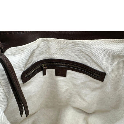 interno  Borsa Gucci in tessuto GG e finiture in pelle marrone, di lusso, originale, ottime condizioni, usata. 