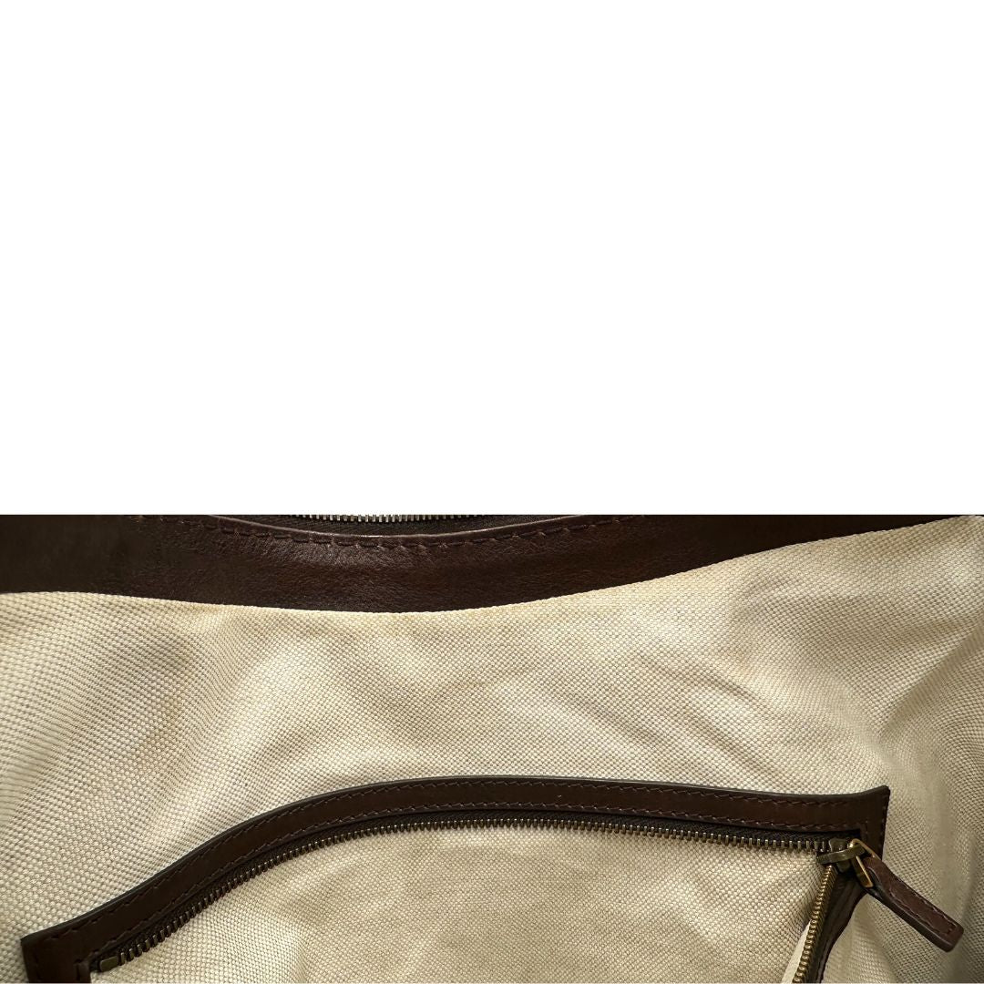 interno interno  Borsa Gucci in tessuto GG e finiture in pelle marrone, di lusso, originale, ottime condizioni, usata.  