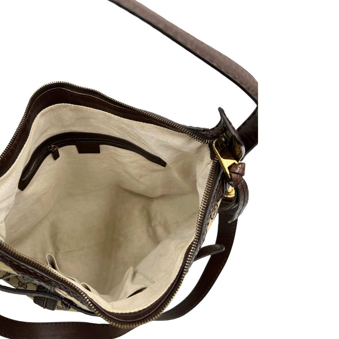 interno  Borsa Gucci in tessuto GG e finiture in pelle marrone, di lusso, originale, ottime condizioni, usata. 