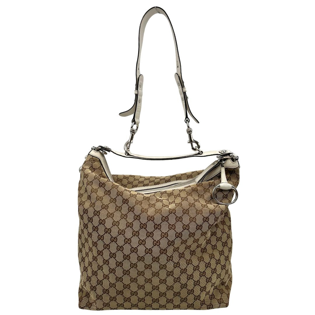 Borsa Gucci in tessuto GG e finiture in pelle bianche, di lusso, originale, usata.