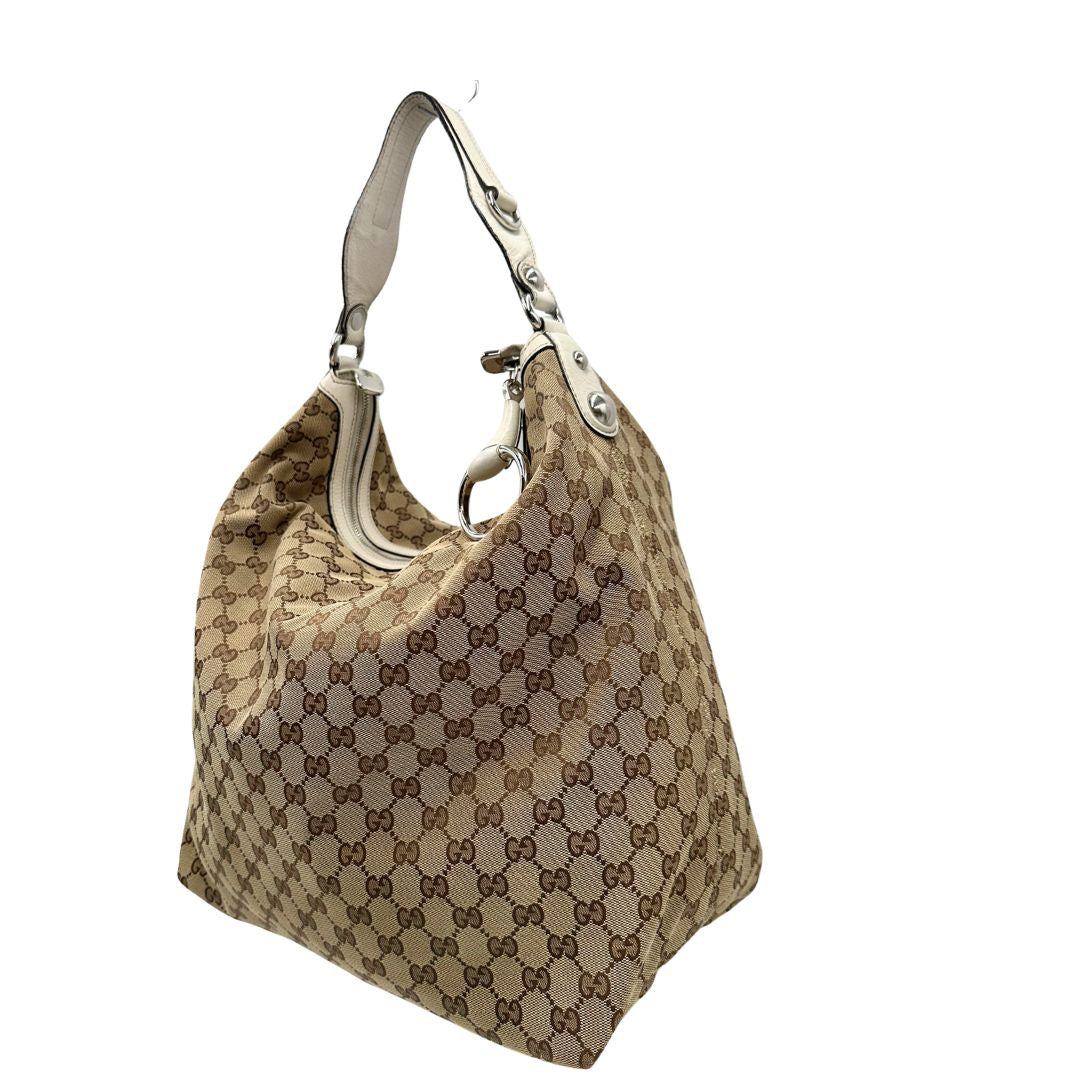 lato Borsa Gucci in tessuto GG e finiture in pelle bianche, di lusso, originale, usata. 