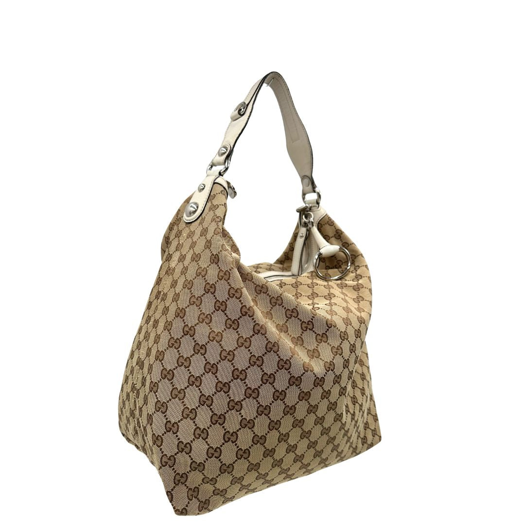 lato Borsa Gucci in tessuto GG e finiture in pelle bianche, di lusso, originale, usata. 