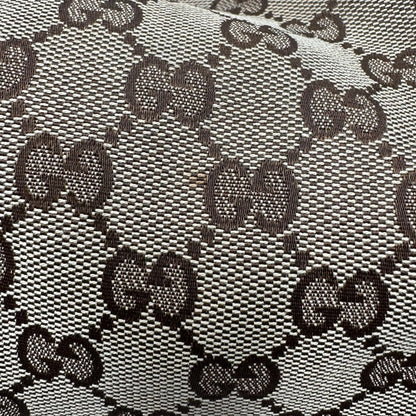 Borsa Gucci in tessuto GG e finiture in pelle bianche, di lusso, originale, usata.