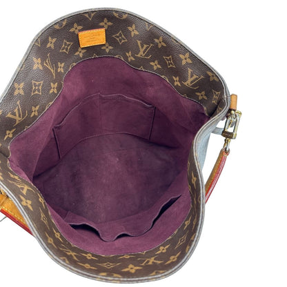 interno Borsa Mélie LV in canvas monogram, munita di un manico singolo e una tracolla amovibile e regolabile, di lusso, originale, ottime condizioni, usata.