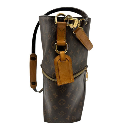 lato Borsa Mélie LV in canvas monogram, munita di un manico singolo e una tracolla amovibile e regolabile, di lusso, originale, ottime condizioni, usata. 