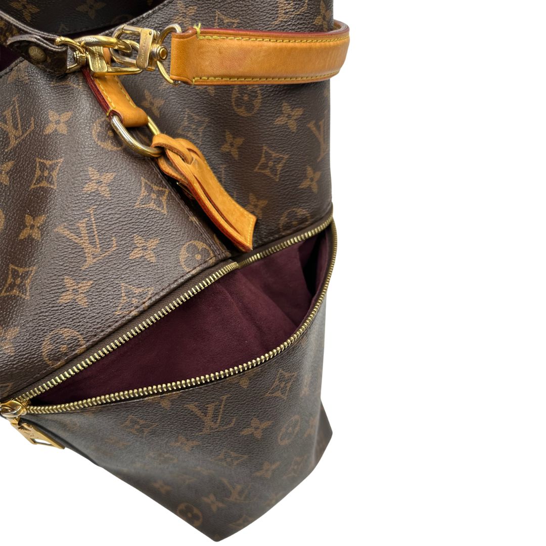 interno Borsa Mélie LV in canvas monogram, munita di un manico singolo e una tracolla amovibile e regolabile, di lusso, originale, ottime condizioni, usata.