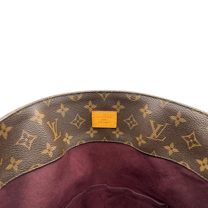 interno Borsa Mélie LV in canvas monogram, munita di un manico singolo e una tracolla amovibile e regolabile, di lusso, originale, ottime condizioni, usata.
