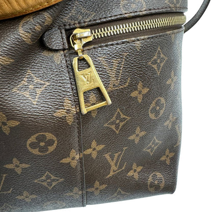 angolo Borsa Mélie LV in canvas monogram, munita di un manico singolo e una tracolla amovibile e regolabile, di lusso, originale, ottime condizioni, usata. 