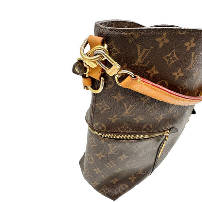 lato Borsa Mélie LV in canvas monogram, munita di un manico singolo e una tracolla amovibile e regolabile, di lusso, originale, ottime condizioni, usata. 