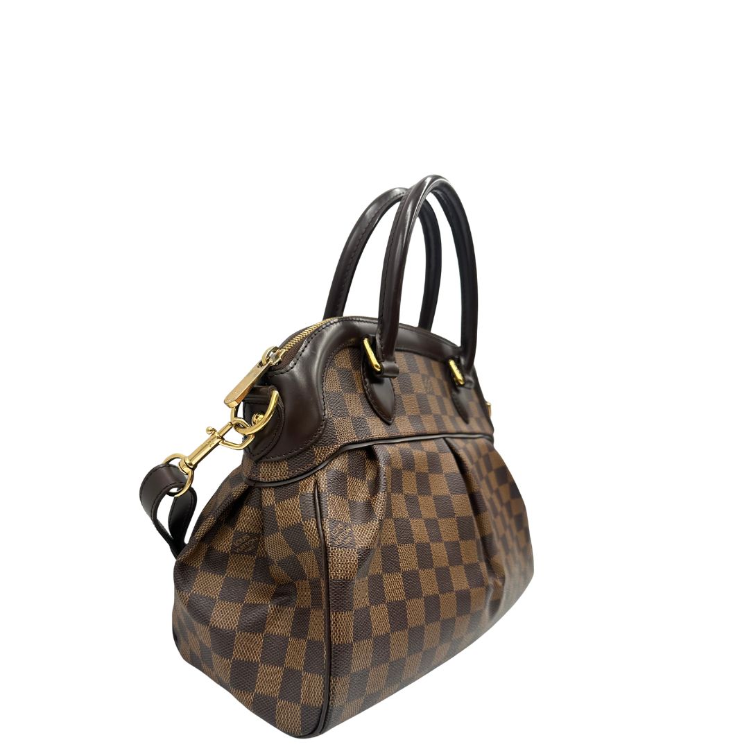 Laterale, Borsa LV in canvas Damier Ébène nella versione MM. Originale, usata, di lusso, in ottime condizioni.