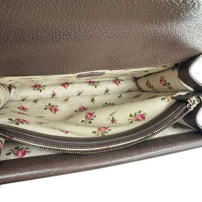 interno  Borsa Gucci Dionysus in pelle marrone impreziosita da iconica striscia Web verde e rossa, di lusso, originale, ottime condizioni, usata. 
