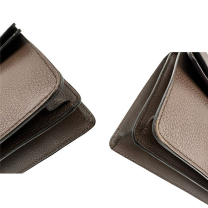angoli  Borsa Gucci Dionysus in pelle marrone impreziosita da iconica striscia Web verde e rossa, di lusso, originale, ottime condizioni, usata. 