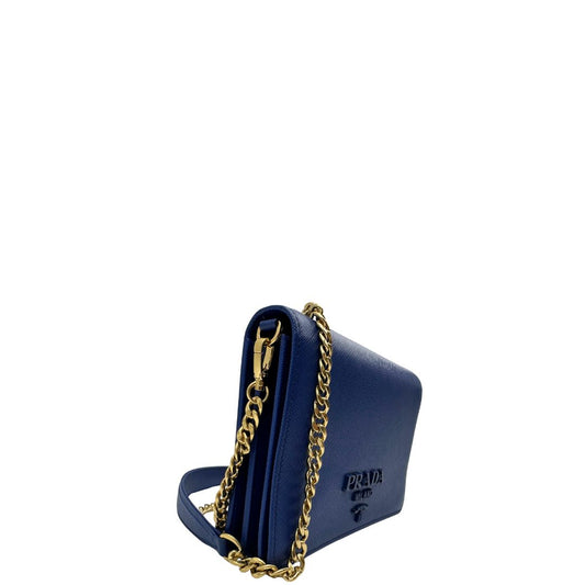 lato  Borsa Prada in pelle saffiano blu e hardware dorato, di lusso, originale, eccellenti condizioni, usata. 