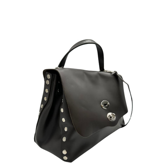 lato Postina in pelle marrone nella versione media, di lusso, originale, ottime condizioni, usata. 