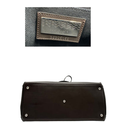 base Postina in pelle marrone nella versione media, di lusso, originale, ottime condizioni, usata. 