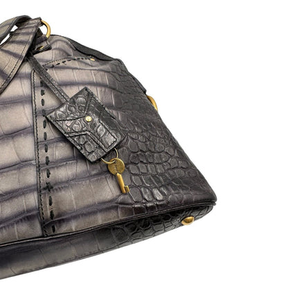 angolo Borsa Muse Saint Laurent trama animalier, di lusso, originale, ottime condizioni, usata. 