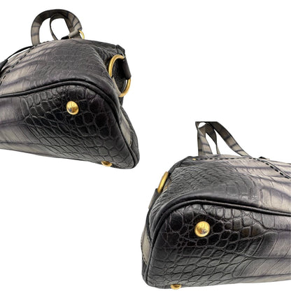 angoli Borsa Muse Saint Laurent trama animalier, di lusso, originale, ottime condizioni, usata. 