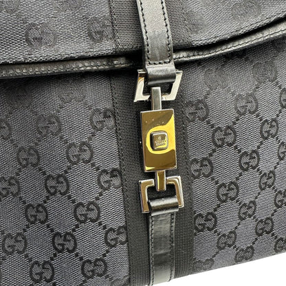 chiusura Borsa Gucci in tessuto GG nero con finiture in pelle tono su tono 
