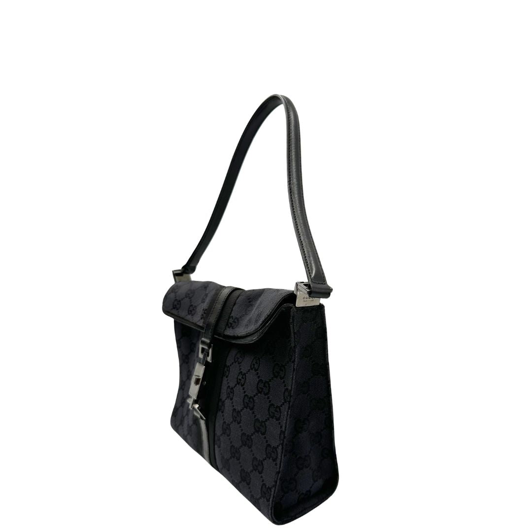 lato Borsa Gucci in tessuto GG nero con finiture in pelle tono su tono 