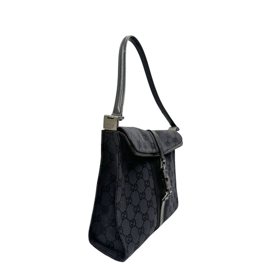 lato Borsa Gucci in tessuto GG nero con finiture in pelle tono su tono 