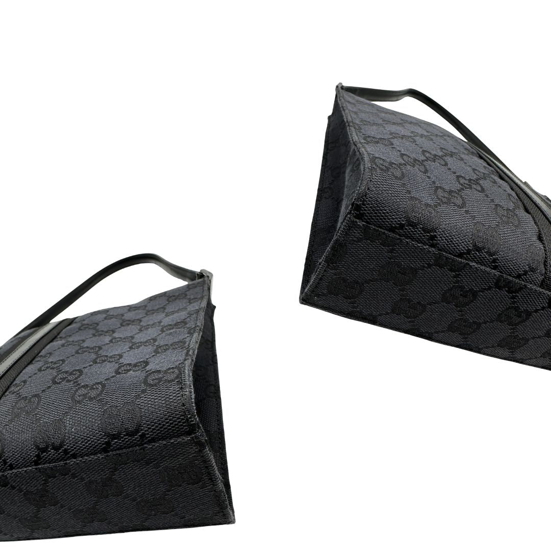 angoli Borsa Gucci in tessuto GG nero con finiture in pelle tono su tono 