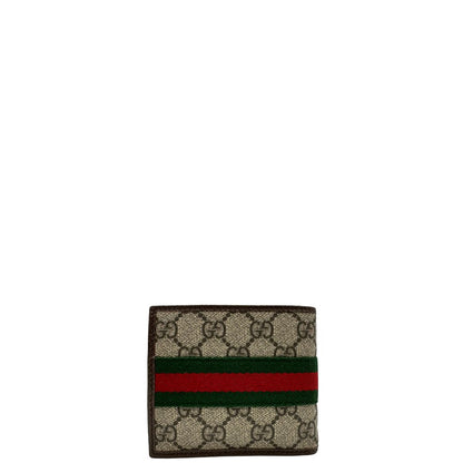 retro  Portafoglio Gucci in canvas GG, finiture in pelle marrone e striscia Web verde e rossa, di lusso, originale, ottime condizioni, usato. 