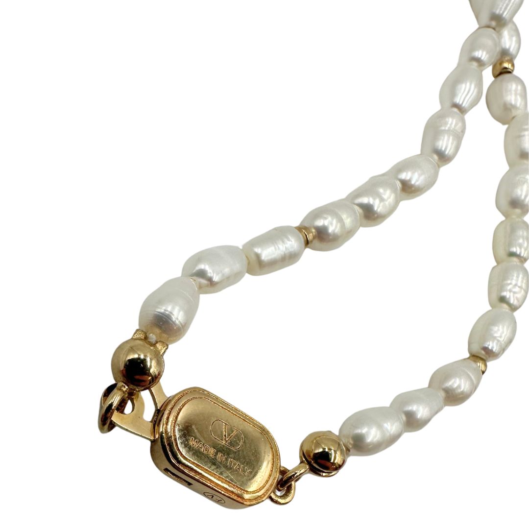 Collana Valentino Garavani in metallo dorato e perle sintetiche, di lusso, originale, ottime condizioni, usata.