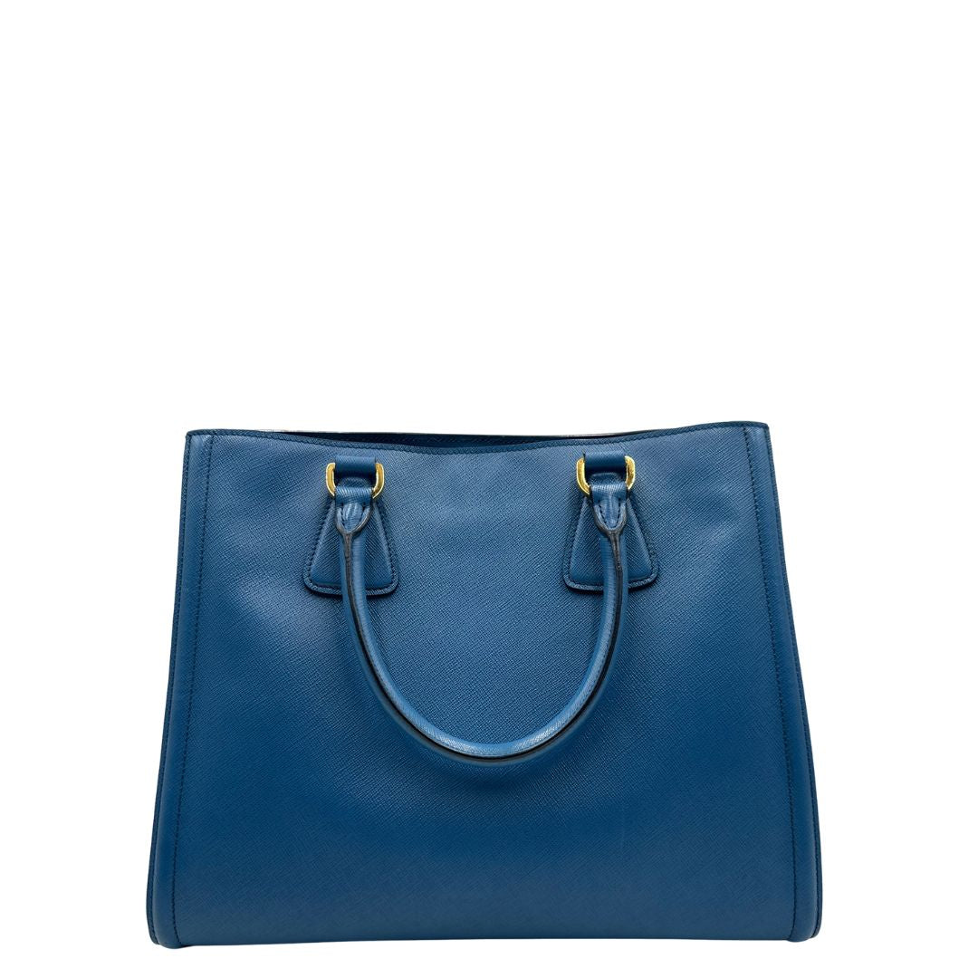 retro Borsa Prada in pelle saffiano in doppia tonalità di blu, munita di doppi manici, di lusso, originale, ottime condizioni. 