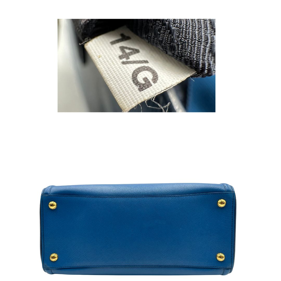 base Borsa Prada in pelle saffiano in doppia tonalità di blu, munita di doppi manici, di lusso, originale, ottime condizioni. 