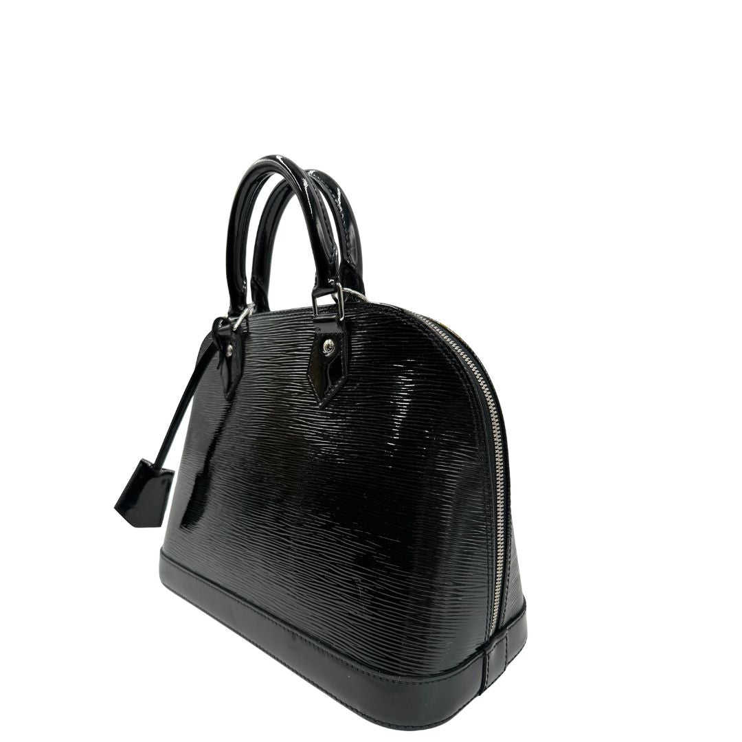 lato Alma in pelle vernis epi nera nella versione PM, di lusso, originale, ottime condizioni, usata. 