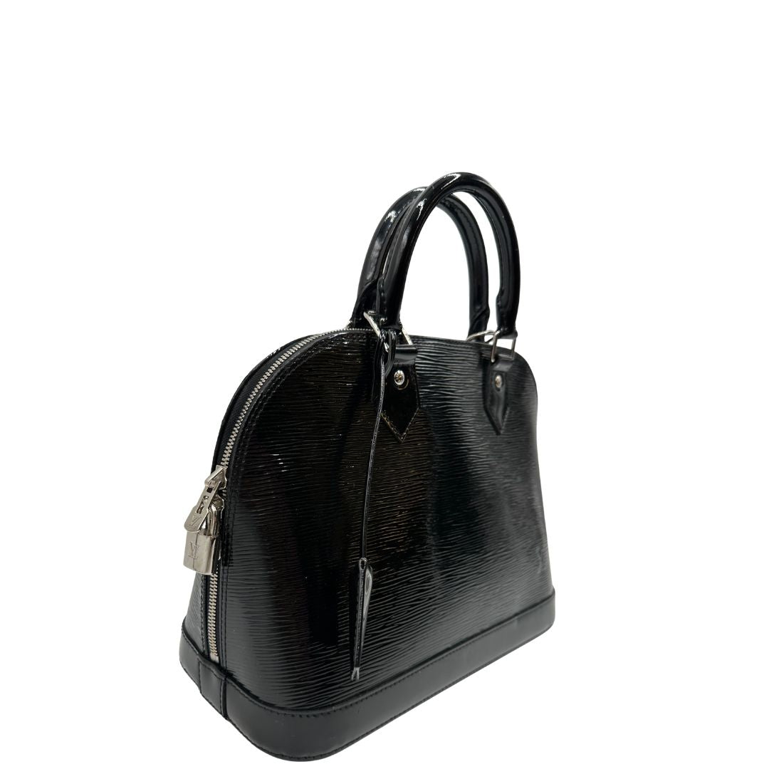 lato Alma in pelle vernis epi nera nella versione PM, di lusso, originale, ottime condizioni, usata. 