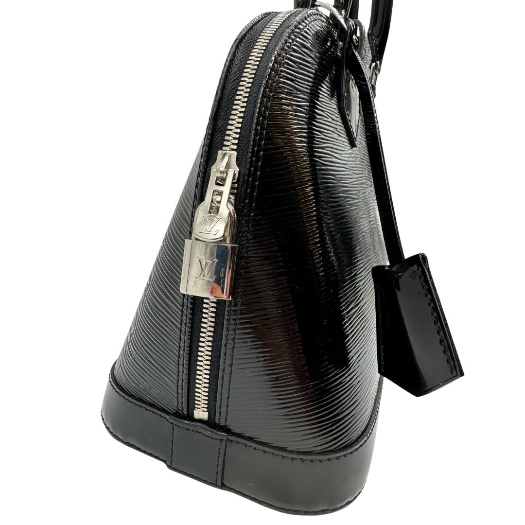lato Alma in pelle vernis epi nera nella versione PM, di lusso, originale, ottime condizioni, usata. 