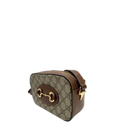 lato  Borsa Gucci Horsebit in canvas GG con finiture in pelle marroni, di lusso, originale, eccellenti condizioni, usata. 