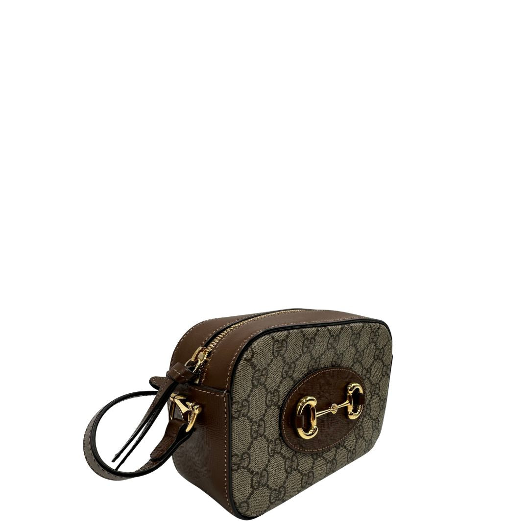 lato  Borsa Gucci Horsebit in canvas GG con finiture in pelle marroni, di lusso, originale, eccellenti condizioni, usata. 