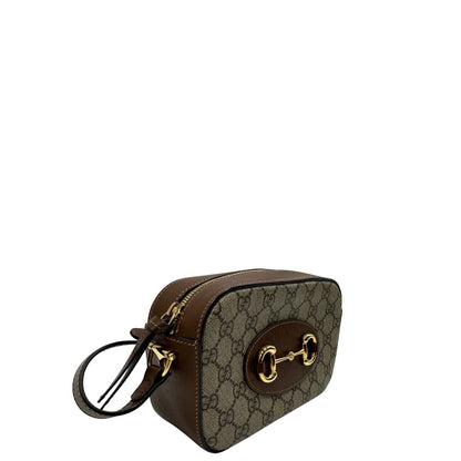 lato  Borsa Gucci Horsebit in canvas GG con finiture in pelle marroni, di lusso, originale, eccellenti condizioni, usata. 