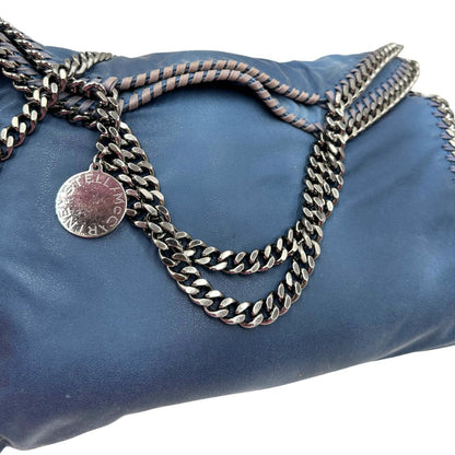 manici Borsa Falabella nella versione fold over tote effetto slavato, di lusso, originale, ottime condizioni, usata. 