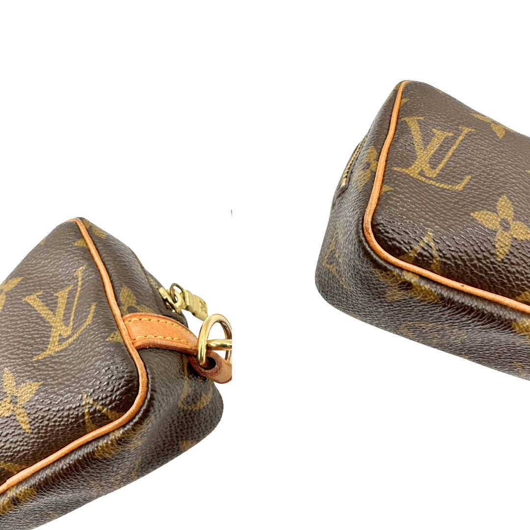angoli Pochette LV Wapity in canvas marrone monogram, di lusso, originale, ottime condizioni, usata. 