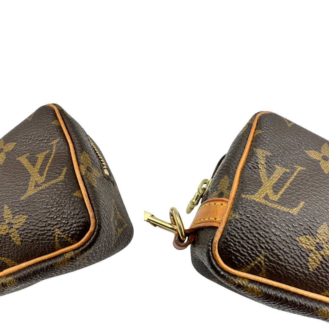 angoli Pochette LV Wapity in canvas marrone monogram, di lusso, originale, ottime condizioni, usata. 