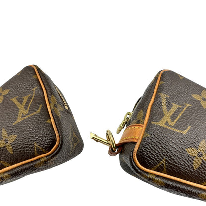 angoli Pochette LV Wapity in canvas marrone monogram, di lusso, originale, ottime condizioni, usata. 