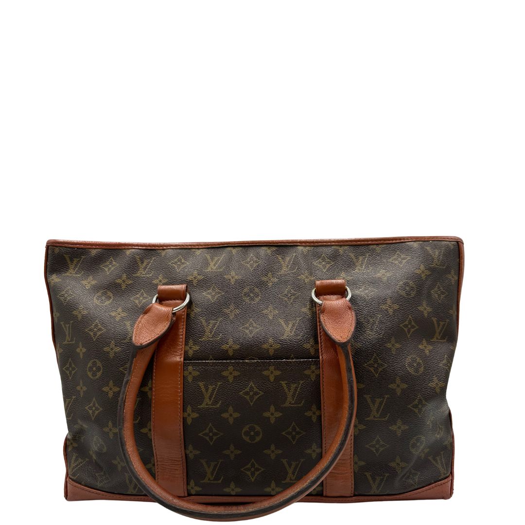 Borsa Vintage Sac Weekend LV in canvas marrone monogram con finiture in pelle color cognac, indossabile a spalla.&nbsp;