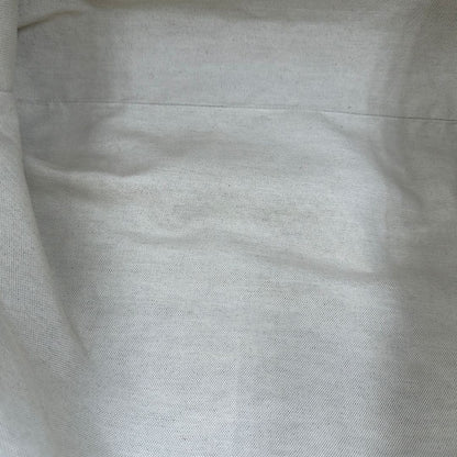 Saint Laurent Icare Maxi Shopping Bag in pelle trapuntata color avorio, impreziosita dall’iconico maxi logo Cassandre dorato frontale, di lusso, originale.