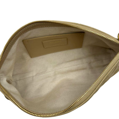 Saint Laurent Icare Maxi Shopping Bag in pelle trapuntata color avorio, impreziosita dall’iconico maxi logo Cassandre dorato frontale, di lusso, originale.