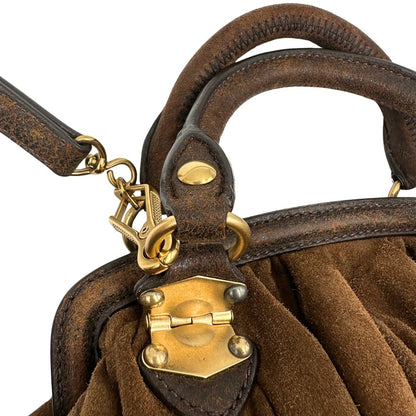  Borsa Miu Miu in pelle scamosciata marrone, indossabile anche a tracolla, di lusso, originale, ottime condizioni, usata.