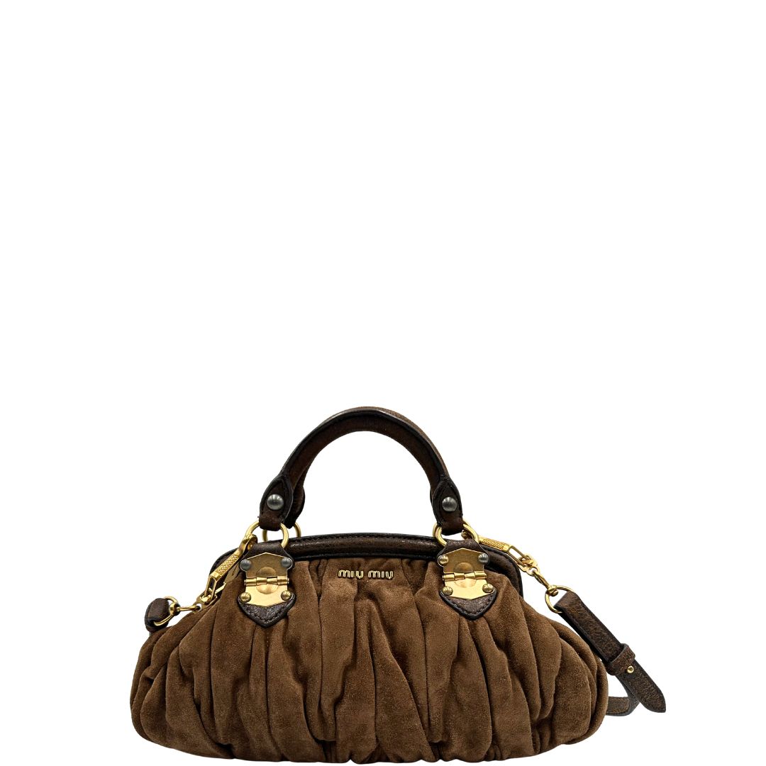  Borsa Miu Miu in pelle scamosciata marrone, indossabile anche a tracolla, di lusso, originale, ottime condizioni, usata.