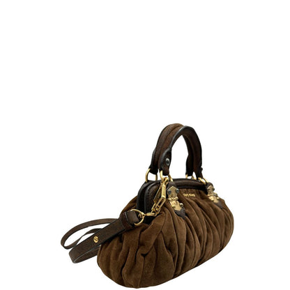  Borsa Miu Miu in pelle scamosciata marrone, indossabile anche a tracolla, di lusso, originale, ottime condizioni, usata.