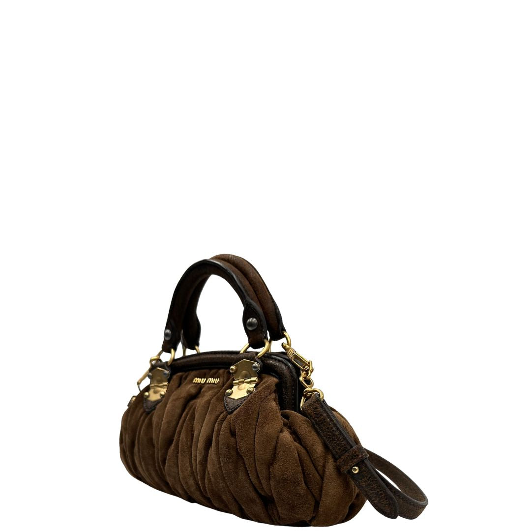  Borsa Miu Miu in pelle scamosciata marrone, indossabile anche a tracolla, di lusso, originale, ottime condizioni, usata.