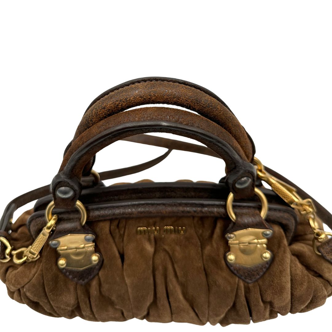  Borsa Miu Miu in pelle scamosciata marrone, indossabile anche a tracolla, di lusso, originale, ottime condizioni, usata.