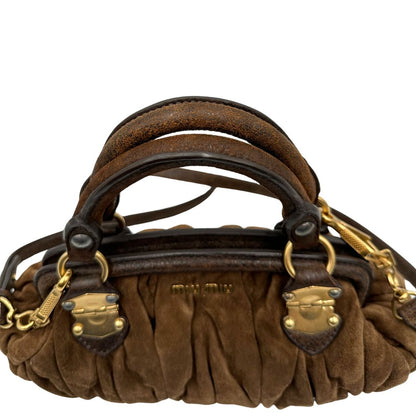  Borsa Miu Miu in pelle scamosciata marrone, indossabile anche a tracolla, di lusso, originale, ottime condizioni, usata.