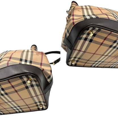 angoli  Borsa Burberry in canvas tartan e finiture in pelle marroni, di lusso, originale, ottime condizioni, usata. 